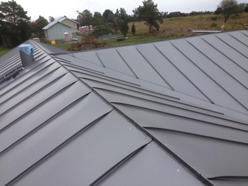 Nybyggnation av sommarhus på sjötomt med aluminiumtak. Styrsö, Tången